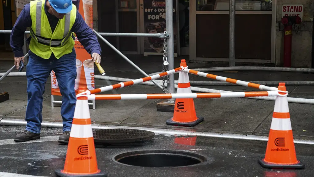 New York woman dies after falling into open manhole after exiting car