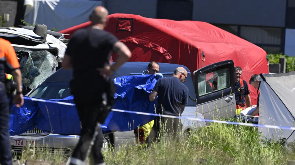 Train and school minibus collide in Belgium, killing four