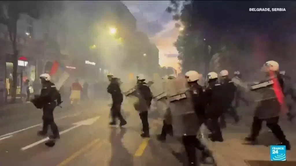 Protesters clash with police after an anti-government rally in Serbia's capital