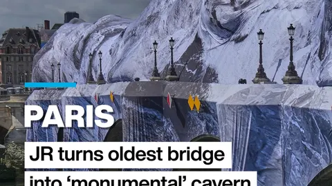 Paris: JR turns oldest bridge into 'monumental' cavern