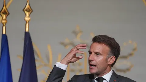 Macron backs symbolic repeal of France's slavery laws, warns against 'false promises' on reparations