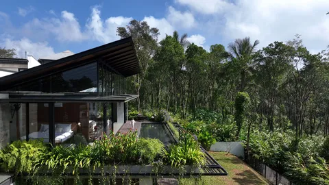 Summer Home by Mindspark Architects overlooks cardamom plantation in India