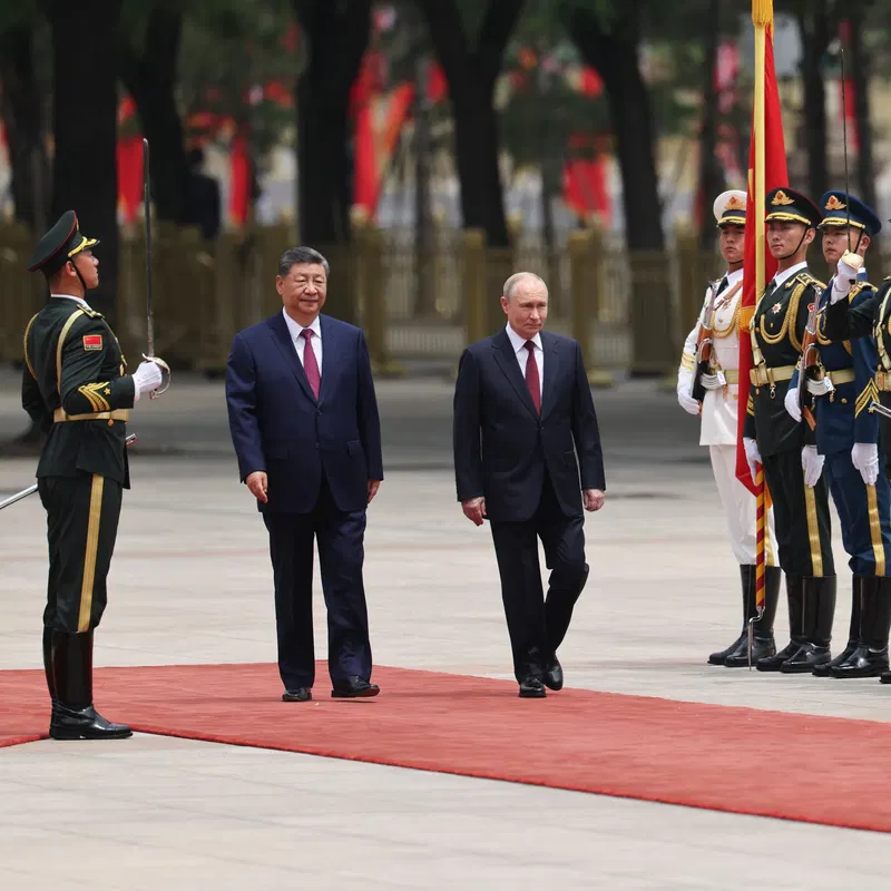 Days After Hosting Trump, Xi Deepens Ties With Putin
