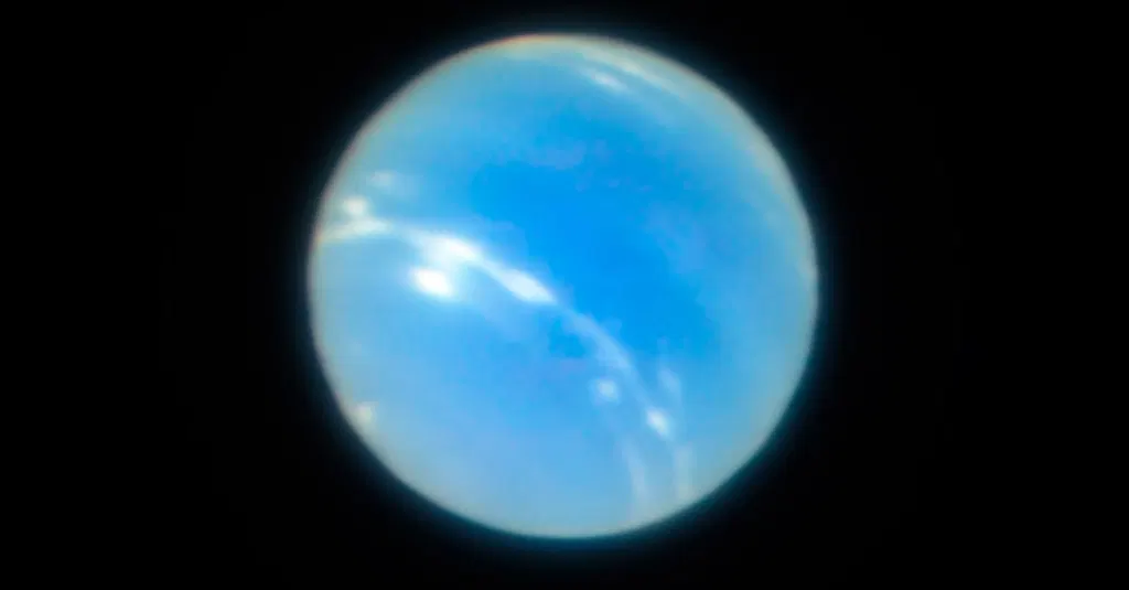 This Moon of Neptune Might Have Survived a Wrecking-Ball Event