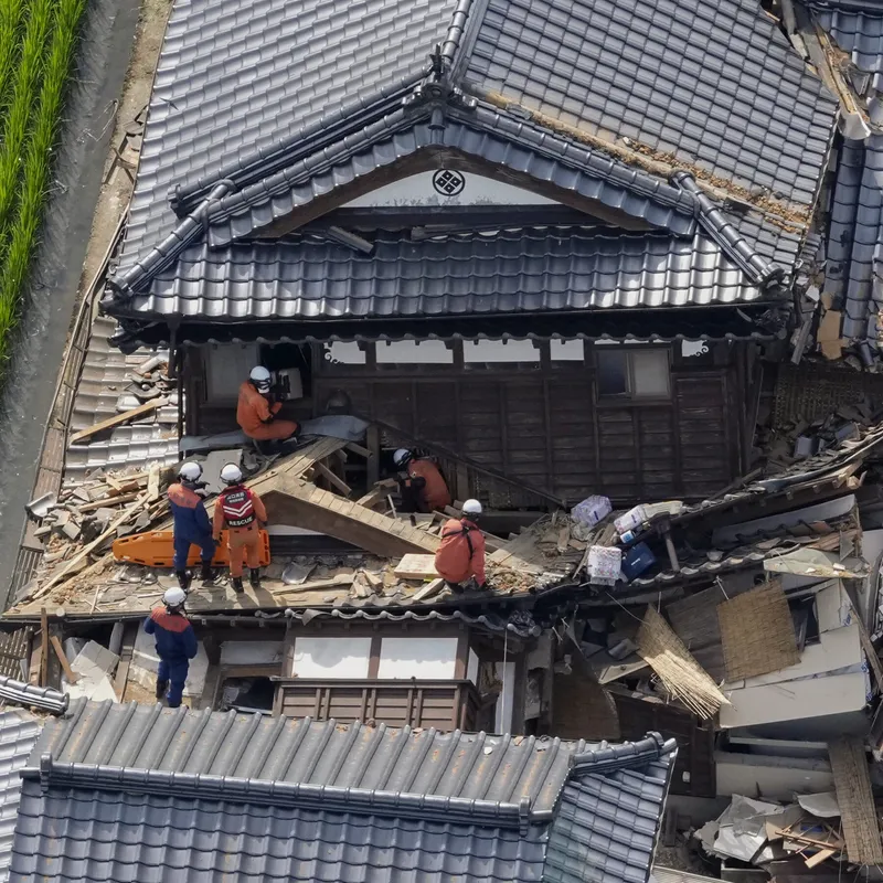 Japan Races to Reach People Trapped After Earthquake Kills at Least 13