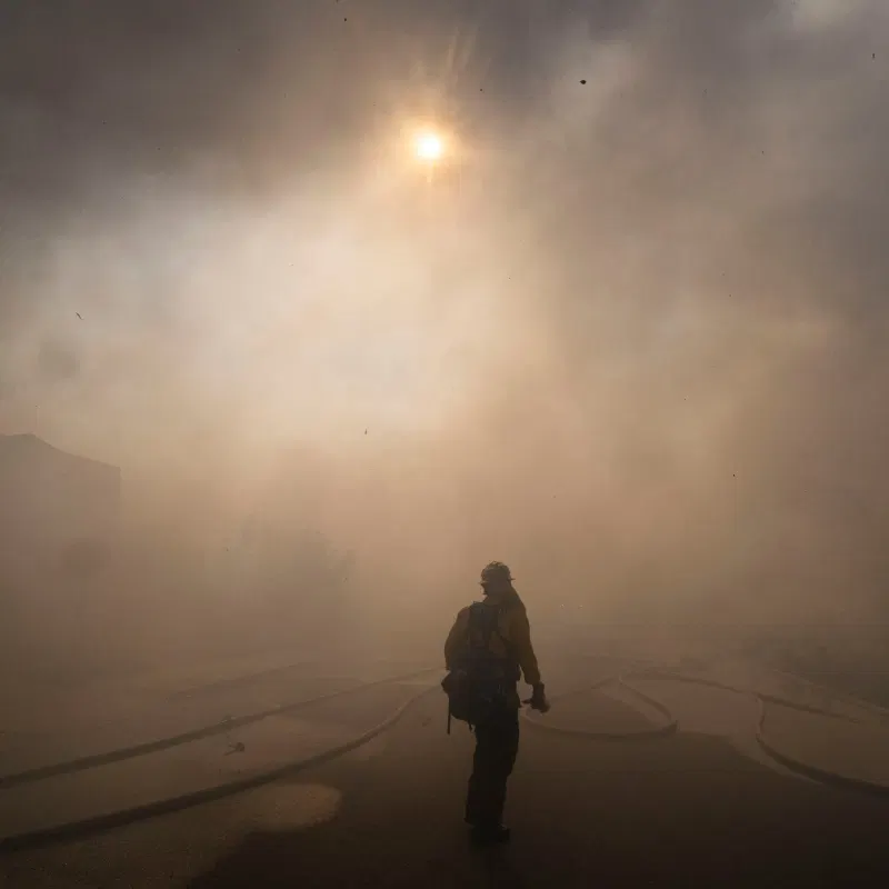 Firefighters Race to Control California Wildfires as Winds Threaten to Spark More