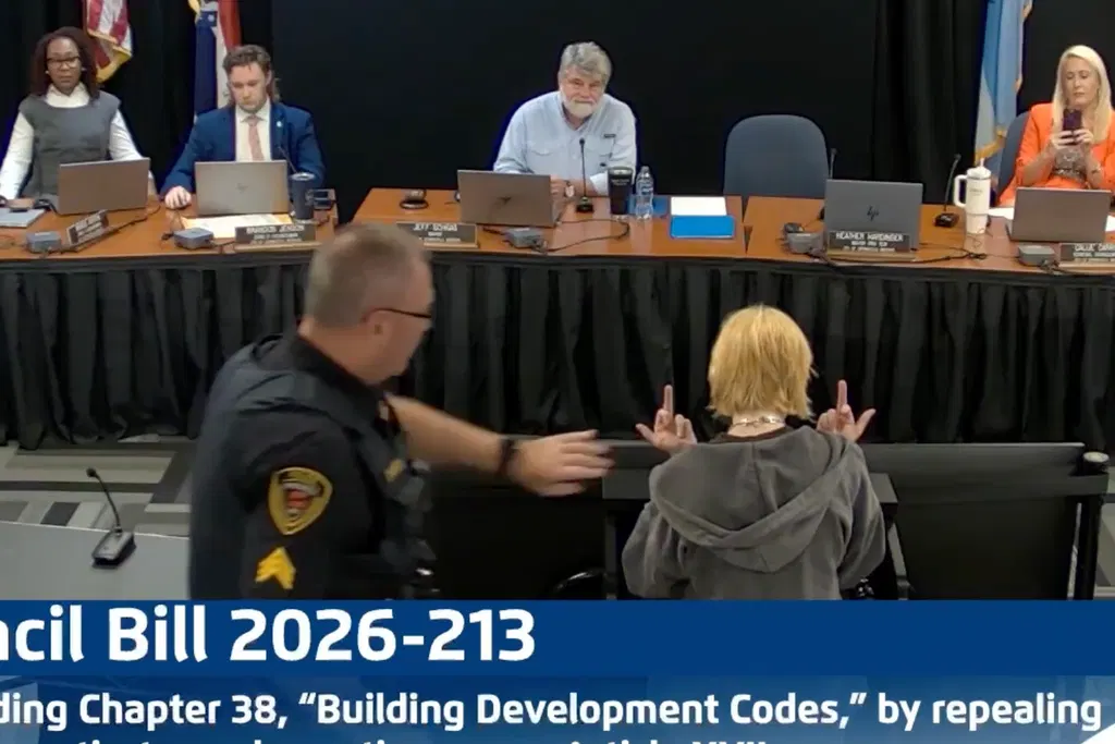 Woman Arrested After City Council Denies Residents Right to Speak on Flock Cameras