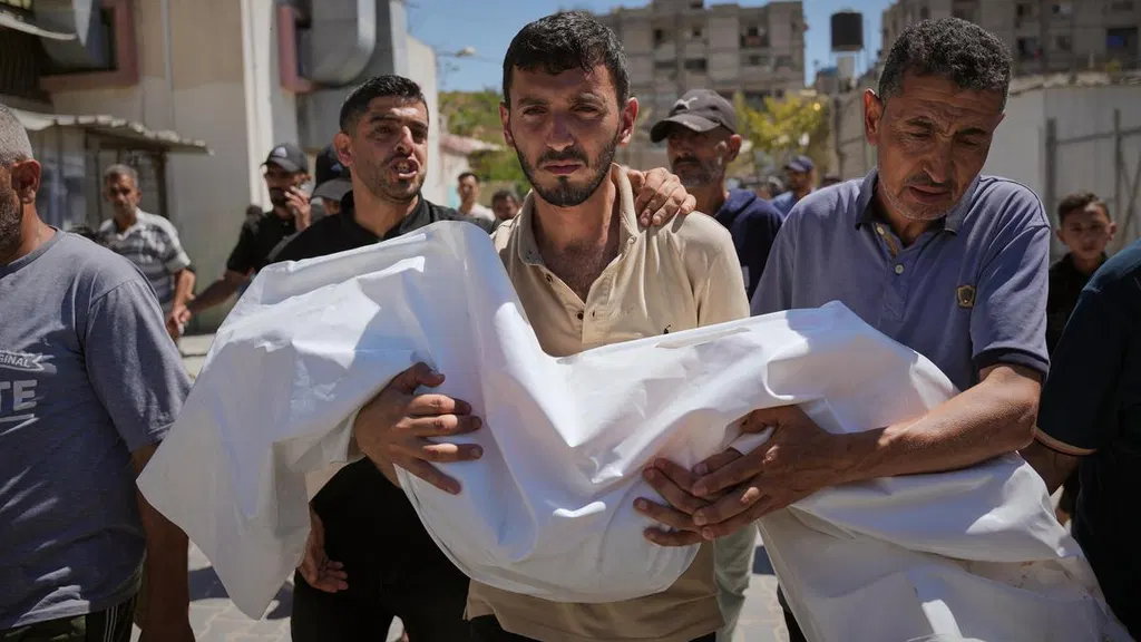 Israeli fire kills six-year-old girl and a woman in Gaza, medics say