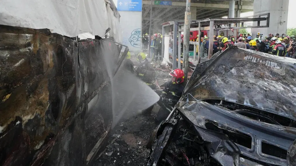 At least 8 killed, 25 injured in train collision that sparks bus fire in Thailand
