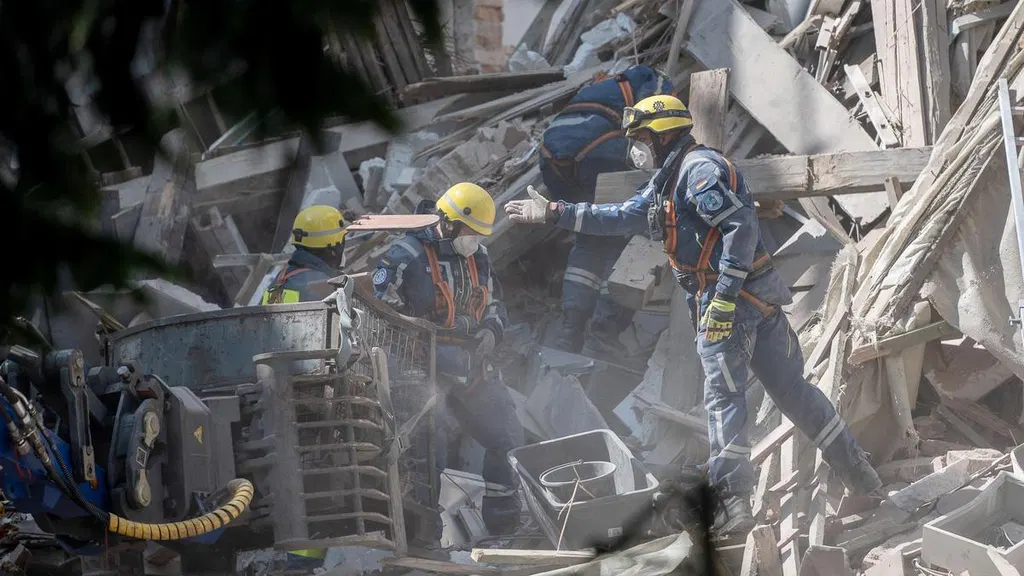 Rescuers search for three missing after German building collapse possibly caused by gas explosion