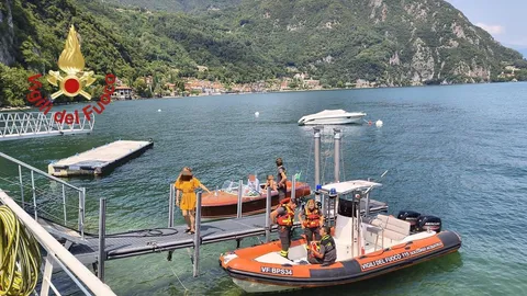 Turista si tuffa nel lago di Como per salvare il figlio, disperso