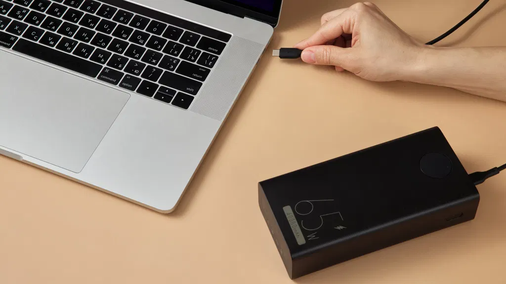 How powerful of a power bank do you need to safely charge a laptop?