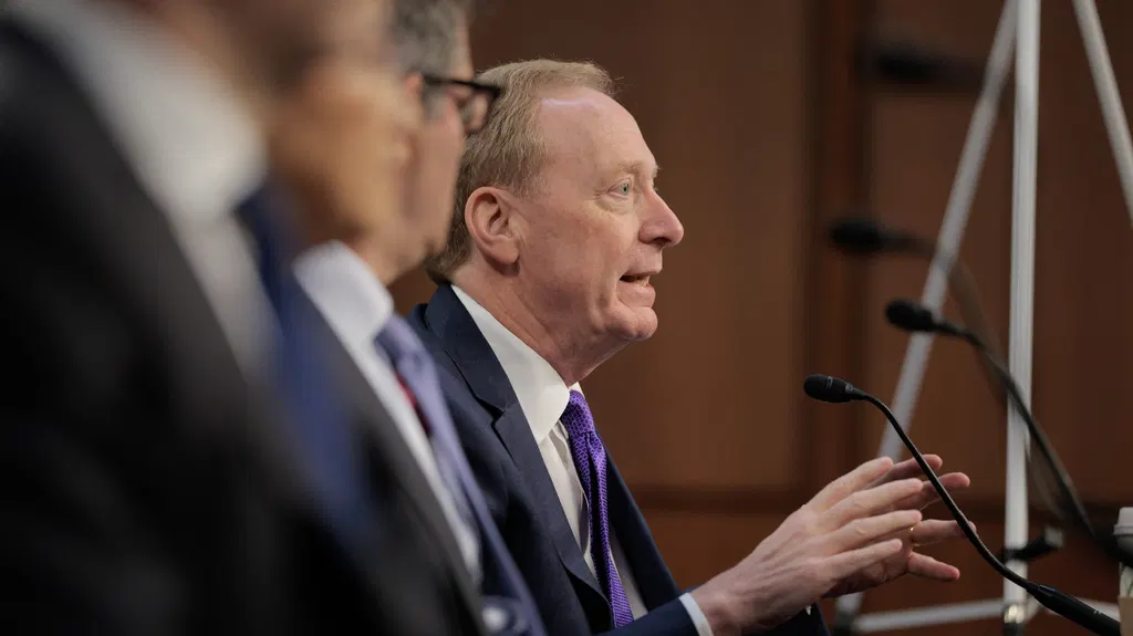 Microsoft's president says AI is less regulated than a carton of milk