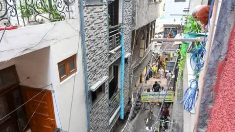 Building in Delhi's Tughlakabad set ablaze on purpose over ₹50,000 debt; 3 held