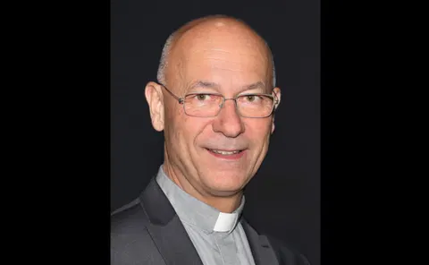 Top Austrian priest to retire early after scandal over female companion