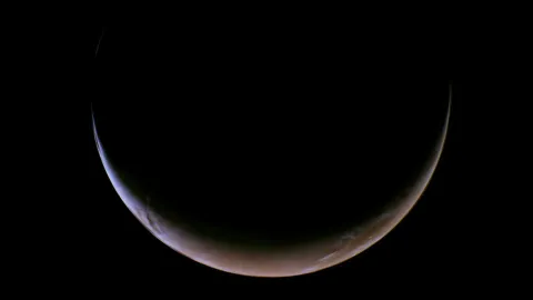 NASA’s Psyche spacecraft uses Mars as a giant slingshot toward a mysterious metal world