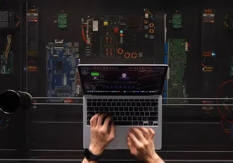This amazing DIY desk uses a camera and a motor to charge your phone wherever you set it down